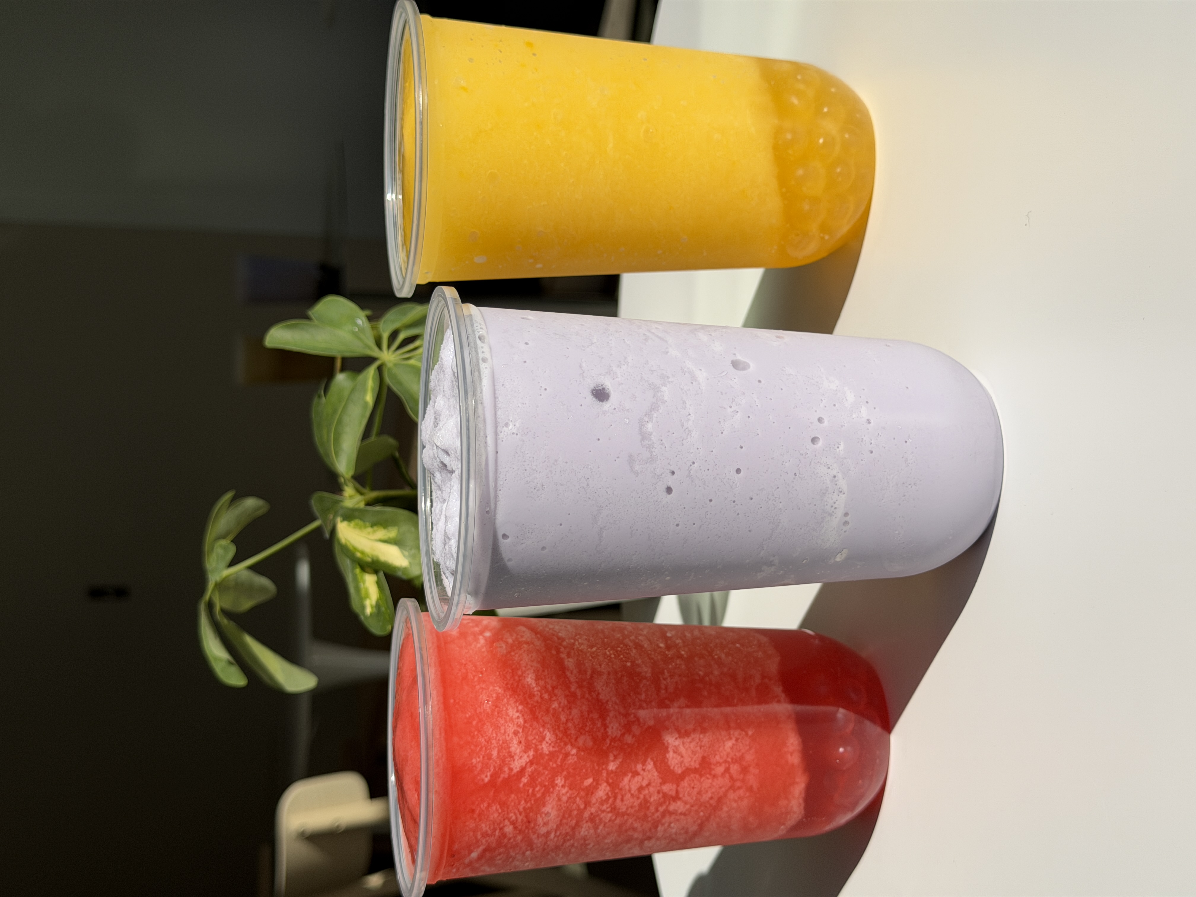 Strawberry, taro and mango blended drinks