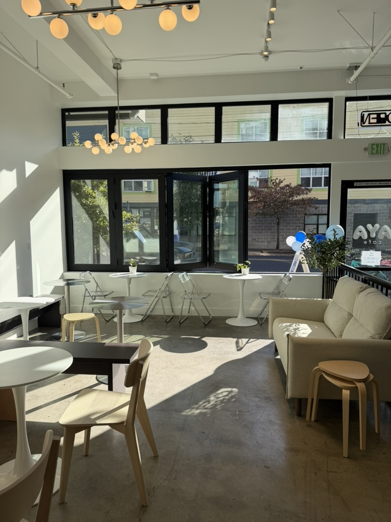 Sunlight fills AYA Cafe’s window seating and cozy sofa